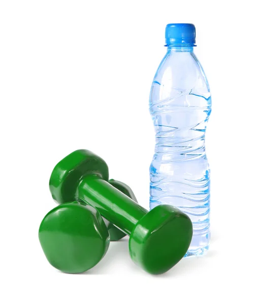 stock image Green dumbbells and a bottle of water