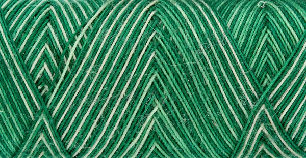Green spool of thread — Stock Photo, Image