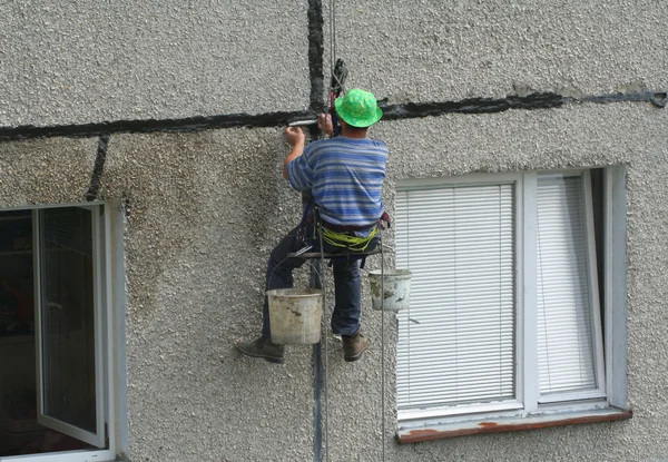 stock image Renovation worker on a block of flats