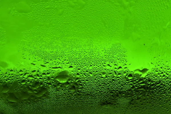 Waterdrops on green glass — Stock Photo, Image