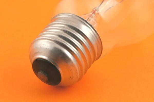 Bulb macro on orange — Stock Photo, Image