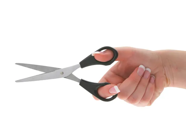 Mão feminina segurando tesoura — Fotografia de Stock