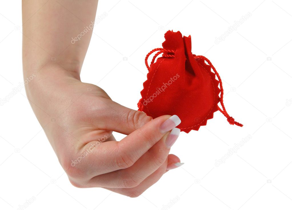 Hand holding red gift