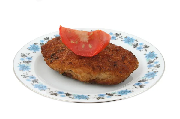 Bistecca con pomodoro su un piatto modellato — Foto Stock