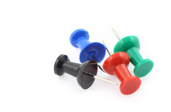 Colorful pushpins on white — Stock Photo, Image