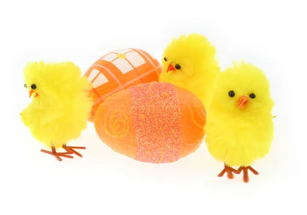 Toy chickens with decorated eggs — Stock Photo, Image