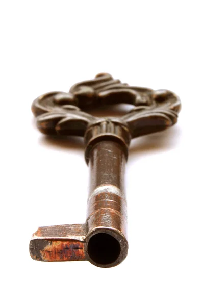 Vintage key on white — Stock Photo, Image