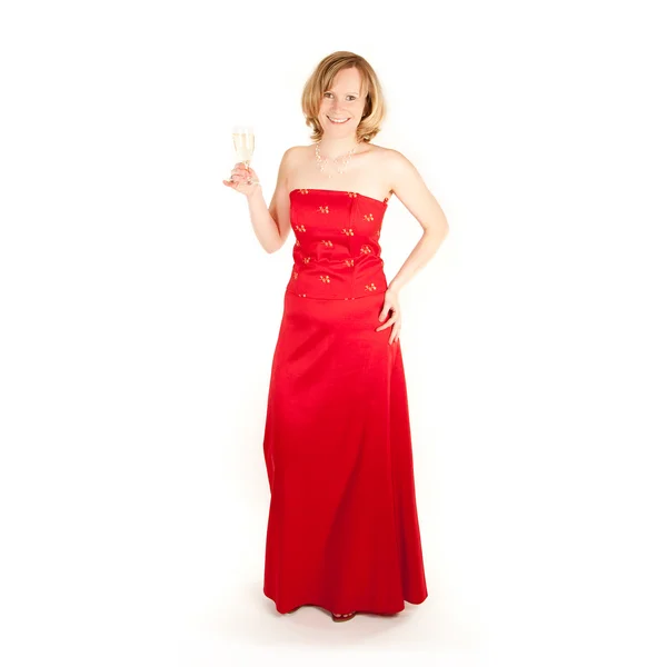 Молода жінка в довгому з шампанським — стокове фото