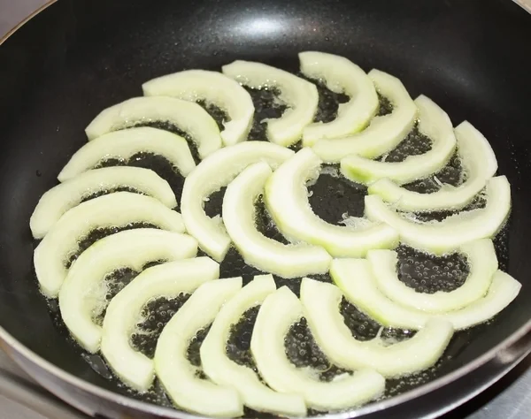 stock image Courgettes fried in a skillet