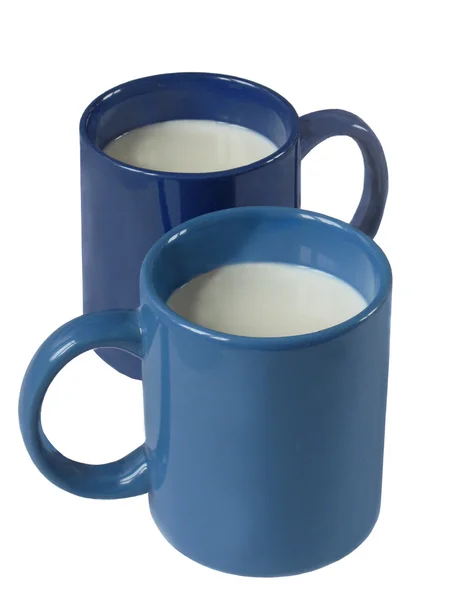 Δύο μπλε κούπες με γάλα — Φωτογραφία Αρχείου