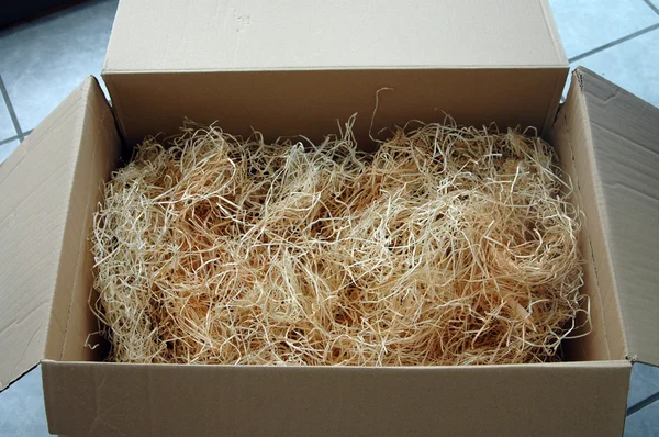 Wood wool in a cardboard