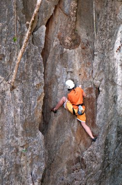 Climbing the rocks clipart