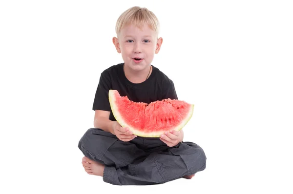 Lachende jongen met watermeloen — Stockfoto