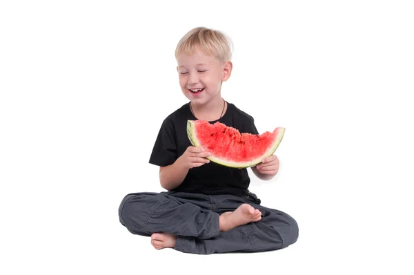 Vergadering jongen met watermeloen — Stockfoto