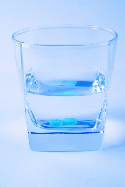 Pill in water — Stock Photo, Image