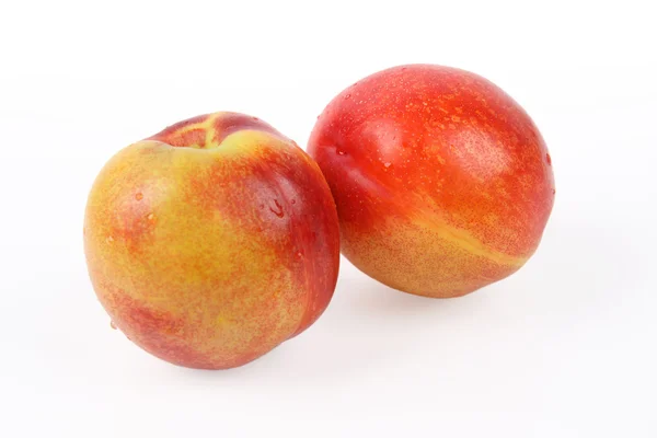 Два персики — стокове фото