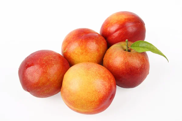 П'ять персиків — стокове фото