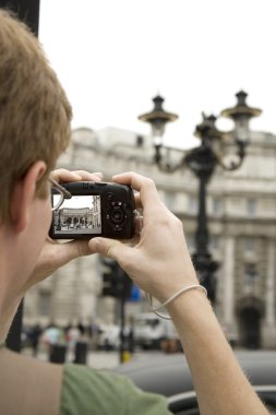 Young Man Photographing the Sites clipart