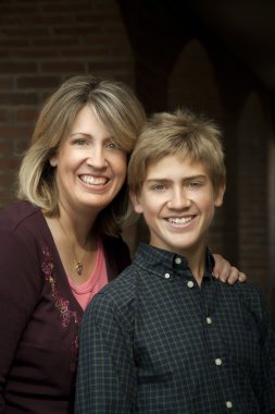 Mother and Teenage Son Portrait clipart