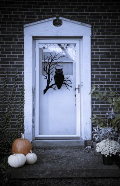 Front Door of Home During Halloween Season clipart