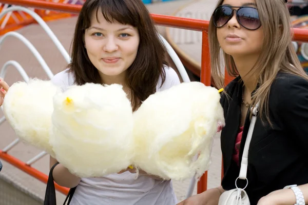 Two girls eating candy floss — Stock Photo, Image