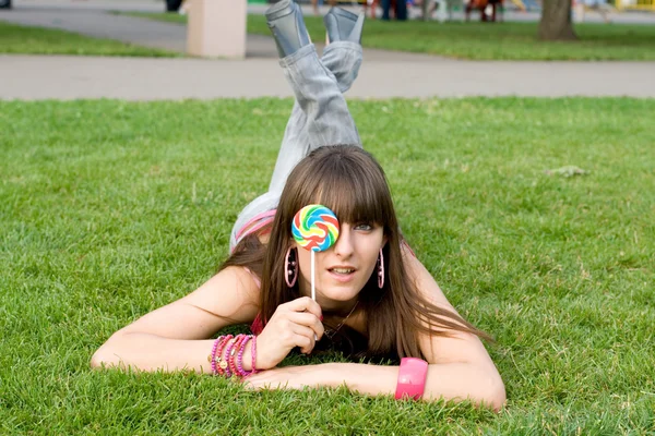 Meisje met een lolly — Stockfoto