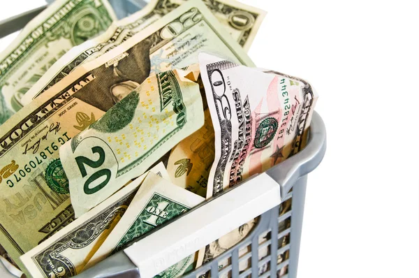 Um dólar em uma cesta de plástico . — Fotografia de Stock