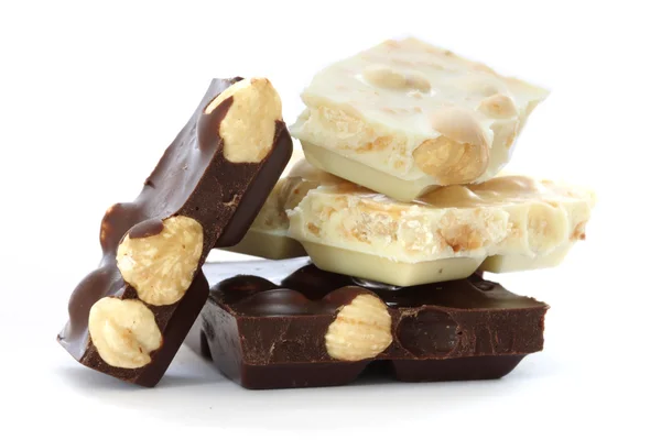 Dark and white chocolate with hazelnuts — Stock Photo, Image