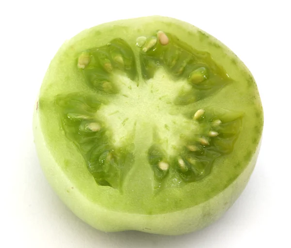Slice of green tomatoe — Stock Photo, Image