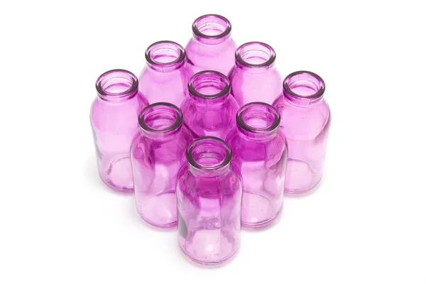 Rosa flaskor tillsammans — Stockfoto