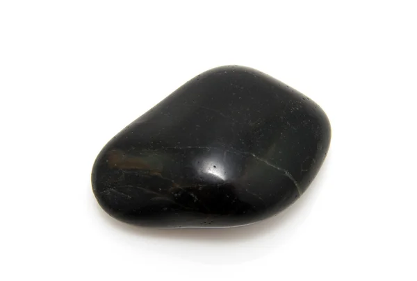 Piedra negra aislada sobre fondo blanco — Foto de Stock