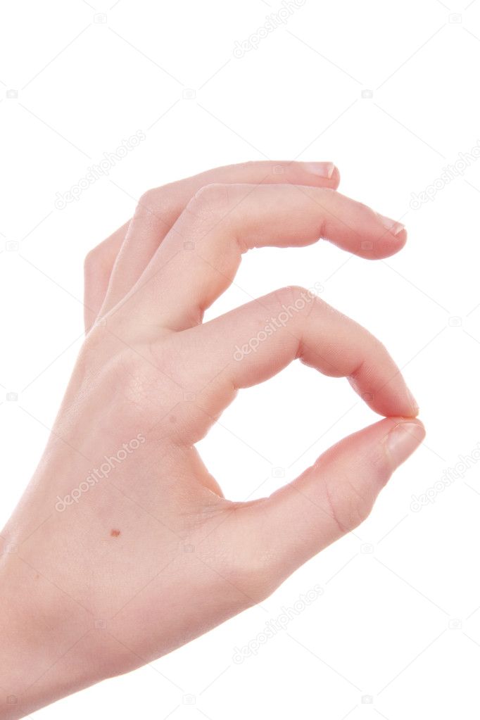 Kids hand is making OK sign