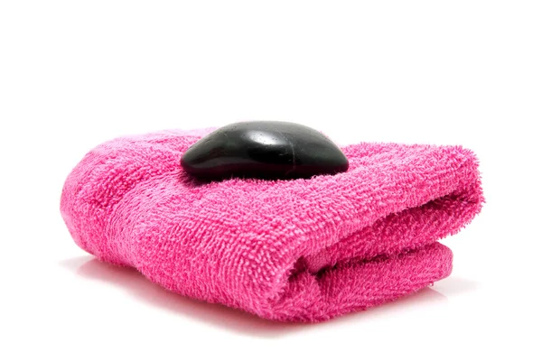 Asciugamano e pietra — Foto Stock