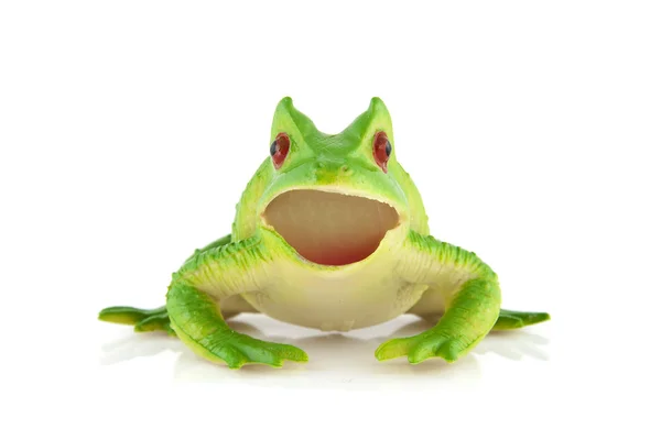 Пластиковая зелёная лягушка — стоковое фото