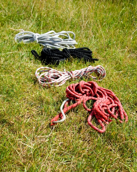 Fisherman rope in grass — Stock Photo, Image