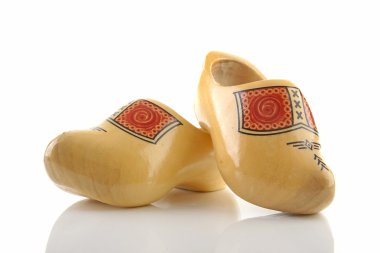 Pair of traditional Dutch wooden shoes clipart