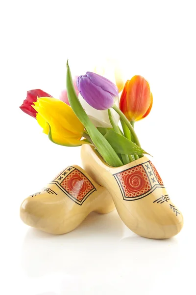 stock image Dutch wooden shoes with tulips