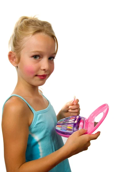 Flicka spelar med make-up — Stockfoto