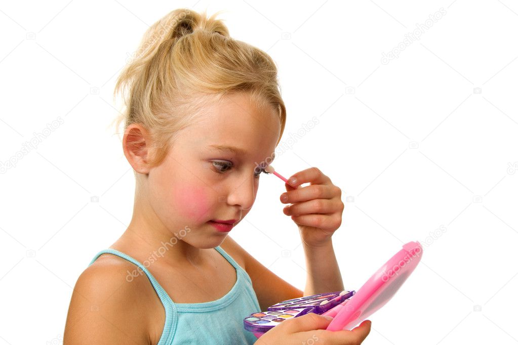 Girl is playing with make-up