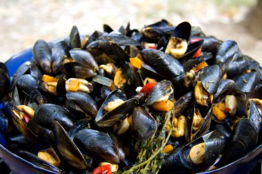 Boiled mussels with vegetalbles clipart