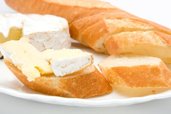 stock image Baguette and french cheese