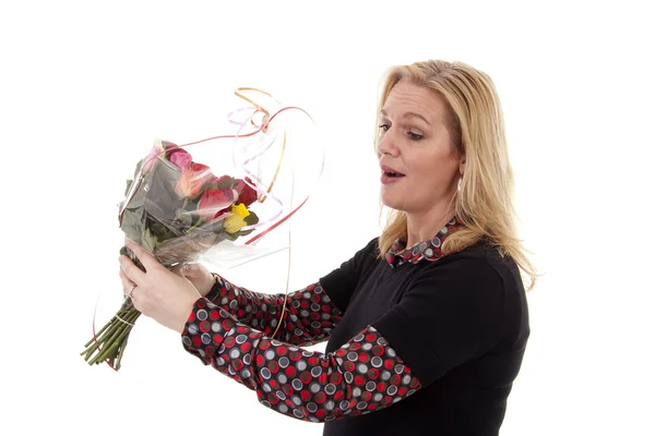 Woman gets flowers — Stock Photo, Image