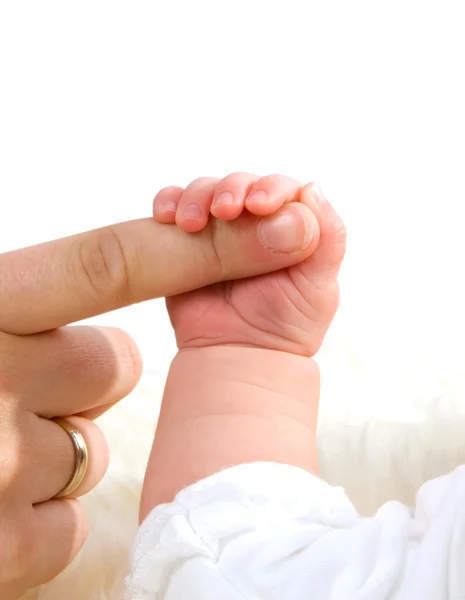 Mother is holding baby's hand — Stock Photo, Image