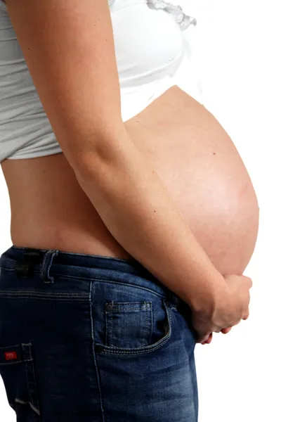 クローズ アップで妊娠中の腹 — ストック写真