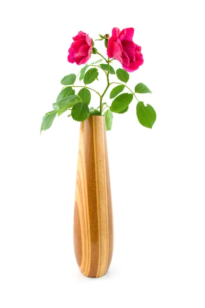 Vaso de madeira com rosas — Fotografia de Stock