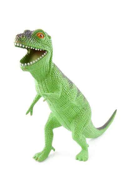 Зеленые динозавры играют в игрушки — стоковое фото
