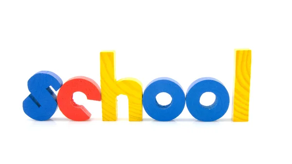 A fából készült színes betűk szó iskola — Stock Fotó