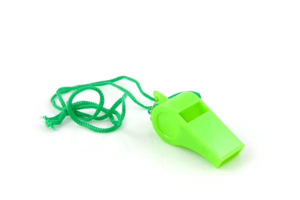 Green colored plastic whistle — Stock Photo, Image