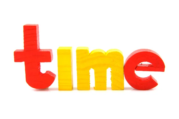 Λέξη χρόνος με πολύχρωμα ξύλινα γράμματα — Φωτογραφία Αρχείου
