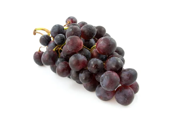 Кластер свежего голубого винограда — стоковое фото